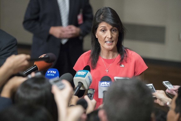 American Ambassador to the United Nations Nikki Haley speaks to reporters after a Security Council vote on a new sanctions resolution that would increase economic pressure on North Korea to return to  ...