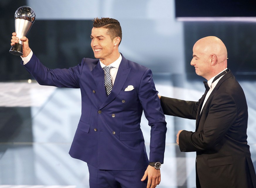 Football Soccer - FIFA Awards Ceremony - Best Men&#039;s Player - Zurich, Switzerland - 09/01/17. FIFA President Gianni Infantino presents the award to Cristiano Ronaldo. REUTERS/Ruben Sprich TPX IMAG ...