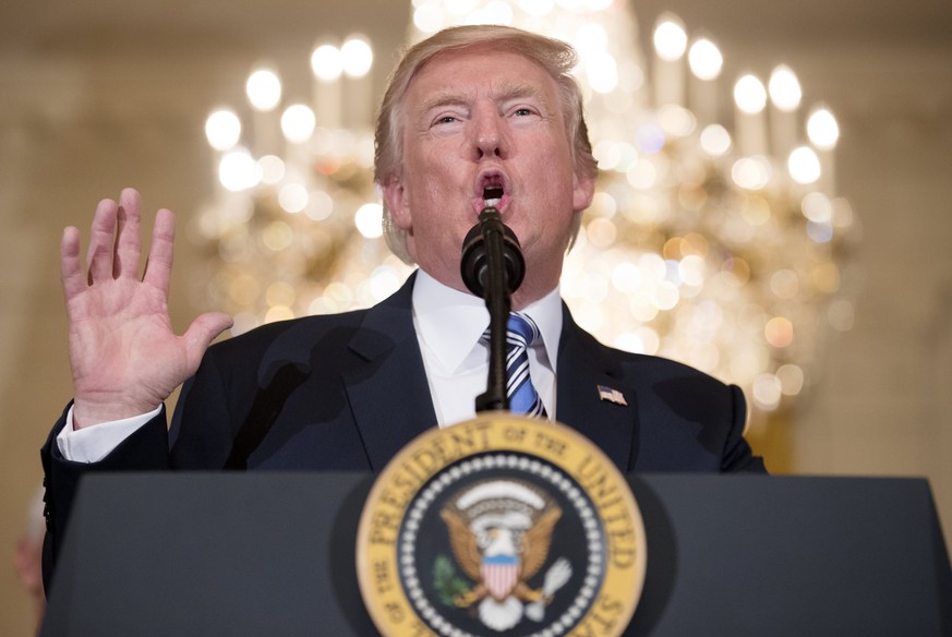 epa06093636 US President Donald J. Trump delivers remarks during a showcase of products made in the United States, in the East Room of the White House in Washington, DC, USA, 17 July 2017. US Presiden ...