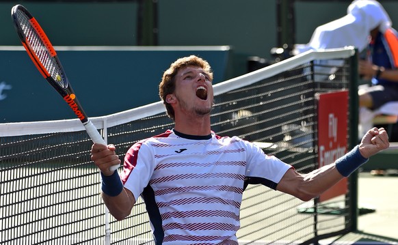 Mar 16, 2017; Indian Wells, CA, USA; Pablo Carreno Busta (ESP) celebrates match point as he defeated Pablo Cuevas (not pictured) in his quarter final match in the BNP Paribas Open at the Indian Wells  ...