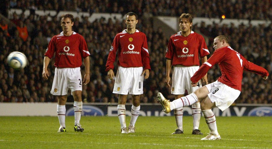 Manchester United&#039;s Wayne Rooney, right, fires in his third goal from a free kick against Fenerbahce during their UEFA Champion&#039;s League group D soccer match at Old Trafford Stadium, Manches ...