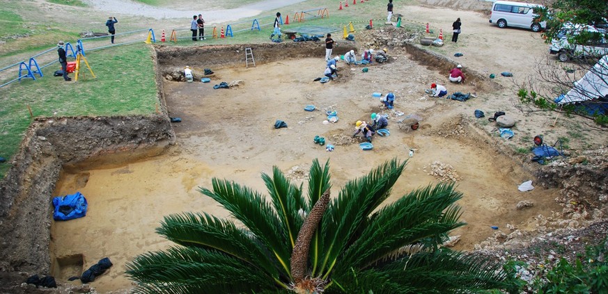 epa05561842 An undated handout photograph provided by the education board of Uruma city on 29 September 2016 shows the excavation site where ancient Roman coins were discovered in the ruins of the Kat ...