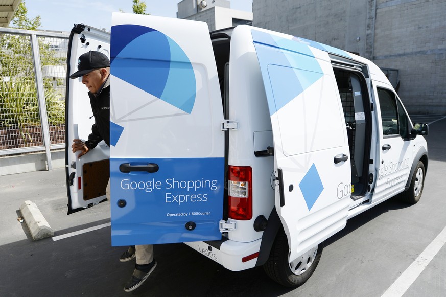 LOS ANGELES, CA - MAY 5: A Google Shopping Express van is seen at Google headquarters on May 5, 2014, in Los Angeles, California. The same day delivery program, which started in San Francisco, is expa ...