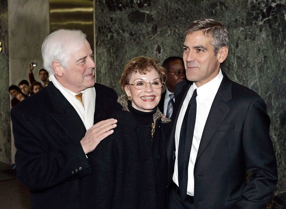 Actor George Clooney, right, accompanied by his parents Nick, left, and Nina, arrives at United Nations Headquarters, Thursday, Jan. 31, 2008. Clooney, in his new role as U.N. messenger of peace, was  ...