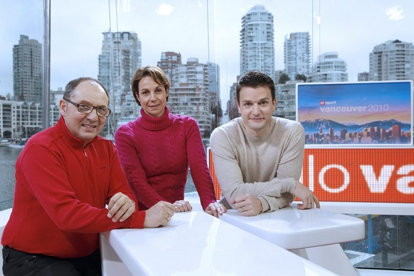 Bernard Thurnheer, left, Regula Spaeni, middle, and Paddy Kaelin, right, standing in the swiss tv studio in the house of switzerland in vancouver before the opening of the XXI Olympic Winter Games in ...