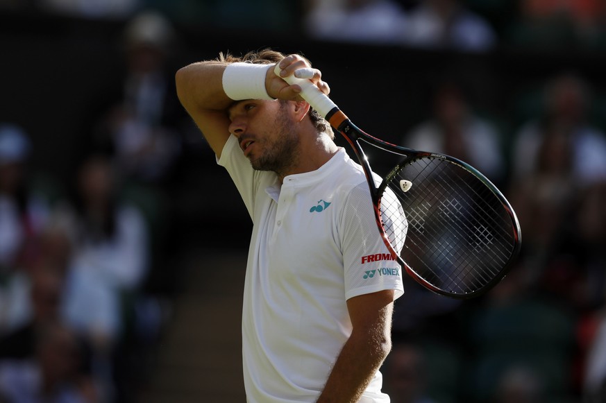 Switzerland&#039;s Stan Wawrinka reacts during his Men&#039;s Singles Match against Russia&#039;s Daniil Medvedev on the opening day at the Wimbledon Tennis Championships in London Monday, July 3, 201 ...
