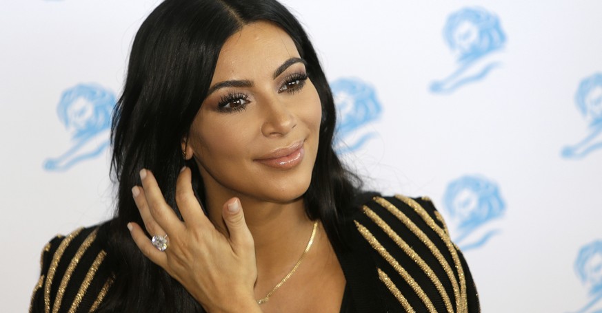 FILE - In this June 24, 2015 file photo, American television personality Kim Kardashian poses for photographers as she attends the Cannes Lions 2015 in Cannes, southern France. The Food and Drug Admin ...