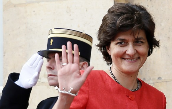 FILE - In this May 17, 2017 file photo, French defense minister, Sylvie Goulard, waves during an handover ceremony with her predecessor, Jean-Yves Le Drian, in Paris. Goulard is stepping down amid an  ...