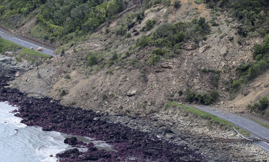 Railway tracks of the main trunk railway line are displaced by a massive landslide that also blocks State Highway One following an earthquake on the coastline, north of Kaikoura, New Zealand Monday, N ...