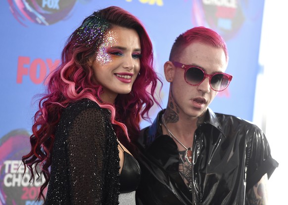 Bella Thorne, left, and rapper Blackbear arrive at the Teen Choice Awards at the Galen Center on Sunday, Aug. 13, 2017, in Los Angeles. (Photo by Jordan Strauss/Invision/AP)