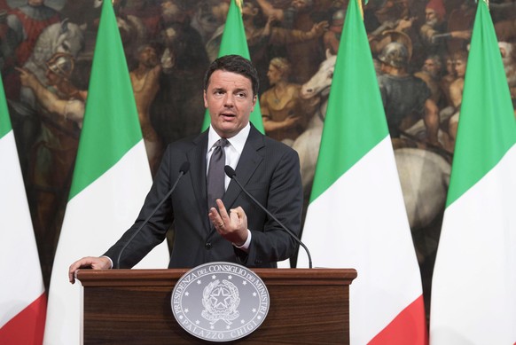 epa05609882 The handout picture released by the Palazzo Chigi Press Office shows Italian Premier Matteo Renzi speaking during a press conference following the strong earthquake in central Italy, Rome, ...