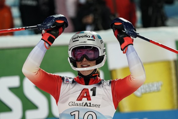 Switzerland's Michelle Gisin reacts after completing during an alpine ski, women's World Cup slalom in Flachau, Austria, Tuesday, Jan.10, 2023. (AP Photo/Giovanni Auletta)