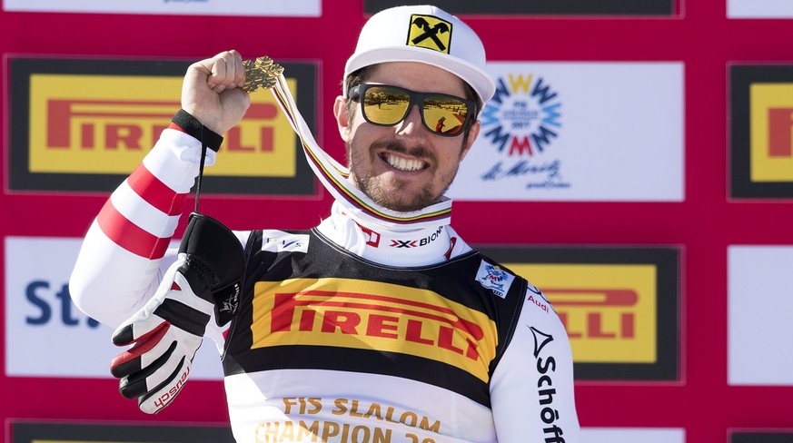 epa05803824 Gold medalist Marcel Hirscher of Austria, celebrates during the award ceremony of the Men&#039;s Slalom race at the 2017 FIS Alpine Skiing World Championships in St. Moritz, Switzerland, 1 ...