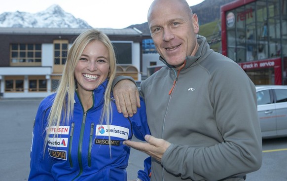 Lara Gut, of Switzerland, jokes with former skier Didier Cuche, of Switzerland, after a press conference of the Alpine Skiing World Cup, in Soelden, Austria, October 25, 2012. The first Alpine Skiing  ...