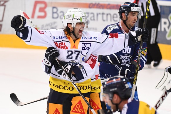 Zug&#039;s player Josh Holden celebrates the 3-3 goal during the preliminary round game of National League A (NLA) Swiss Championship 2016/17 between HC Ambri Piotta and EV Zug, at the ice stadium Val ...