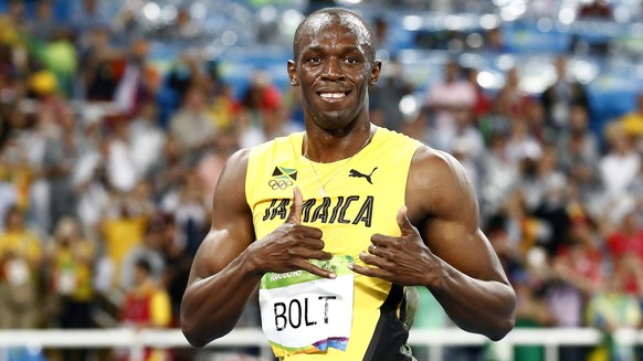 epa05498411 Usain Bolt of Jamaica celebrates after winning the men&#039;s 200m final of the Rio 2016 Olympic Games Athletics, Track and Field events at the Olympic Stadium in Rio de Janeiro, Brazil, 1 ...