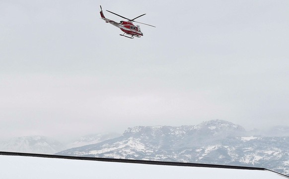 A firefighter helicopter flies over the town of Penne, central Italy, following a series of earthquakes and a snow avalanche hitting a hotel in central Italy, January 20, 2017. REUTERS/Emiliano Grillo ...