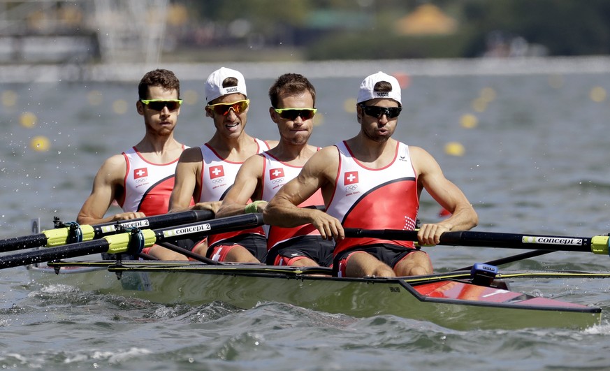 Lucas Tramer, Simon Schuerch, Simon Niepmann, and Mario Gyr, of Switzerland, row for gold in the men&#039;s rowing lightweight four final during the 2016 Summer Olympics in Rio de Janeiro, Brazil, Thu ...