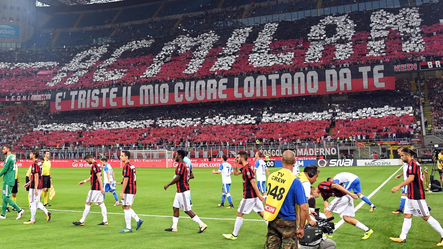 The stadium is crowded with some 65,000 fans as AC Milan and U Craiova enter the field for an Europa League third qualifying round, second leg, soccer match at the San Siro stadium in Milan, Italy, Th ...