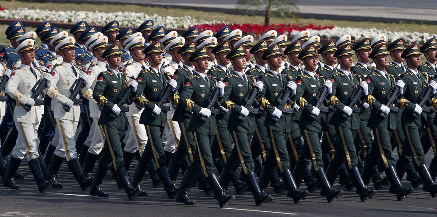 A contingent of the Chinese People&#039;s Liberation Army march during a military parade to mark Pakistan&#039;s Republic Day, in Islamabad, Pakistan, Thursday, March 23, 2017. President Mamnoon Hussa ...