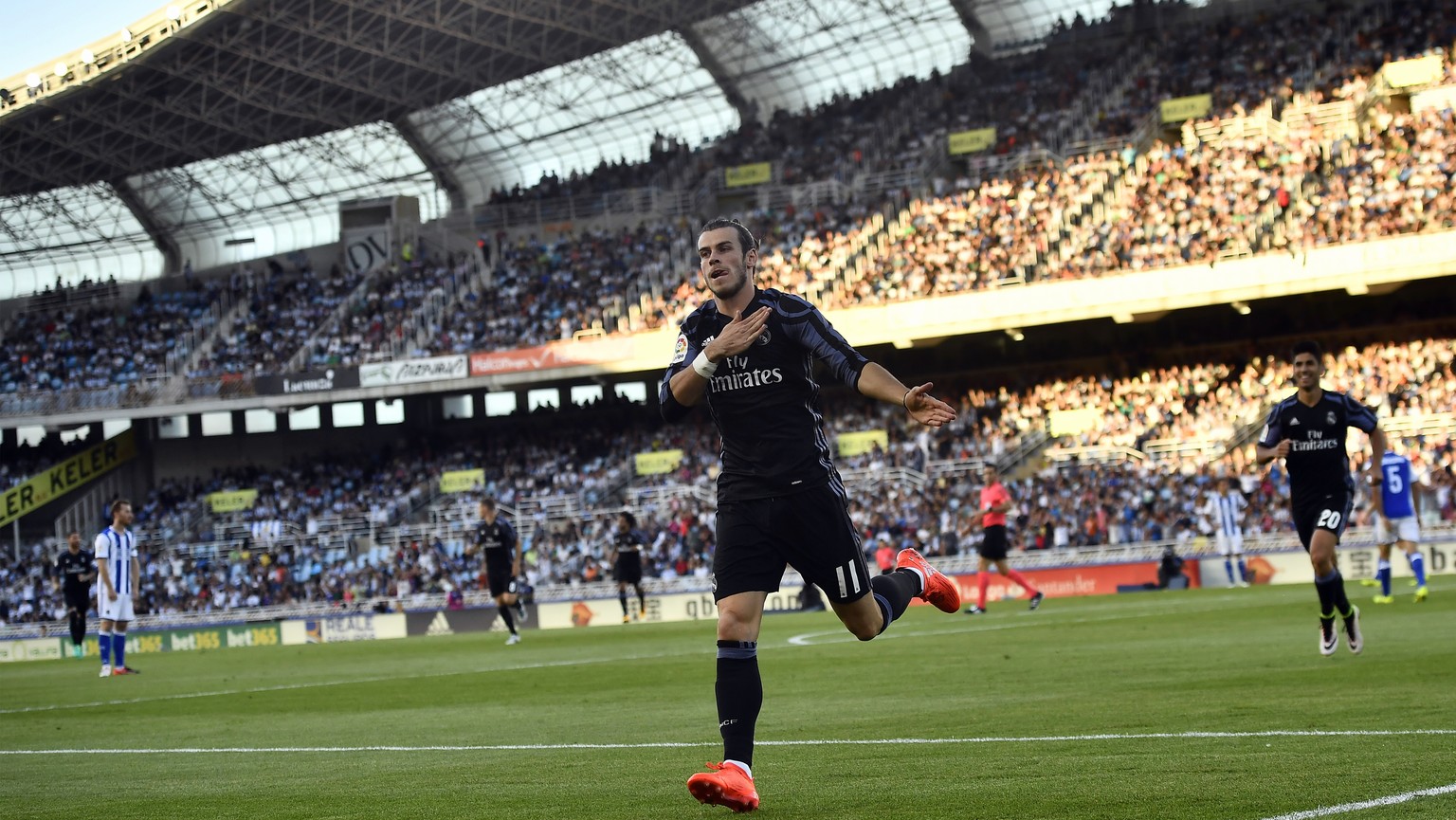 Real Madrid&#039;s Gareth Bale celebrates after scoring against Real Sociedad during the Spanish La Liga soccer match between Real Madrid and Real Sociedad, at Anoeta stadium in San Sebastian, norther ...