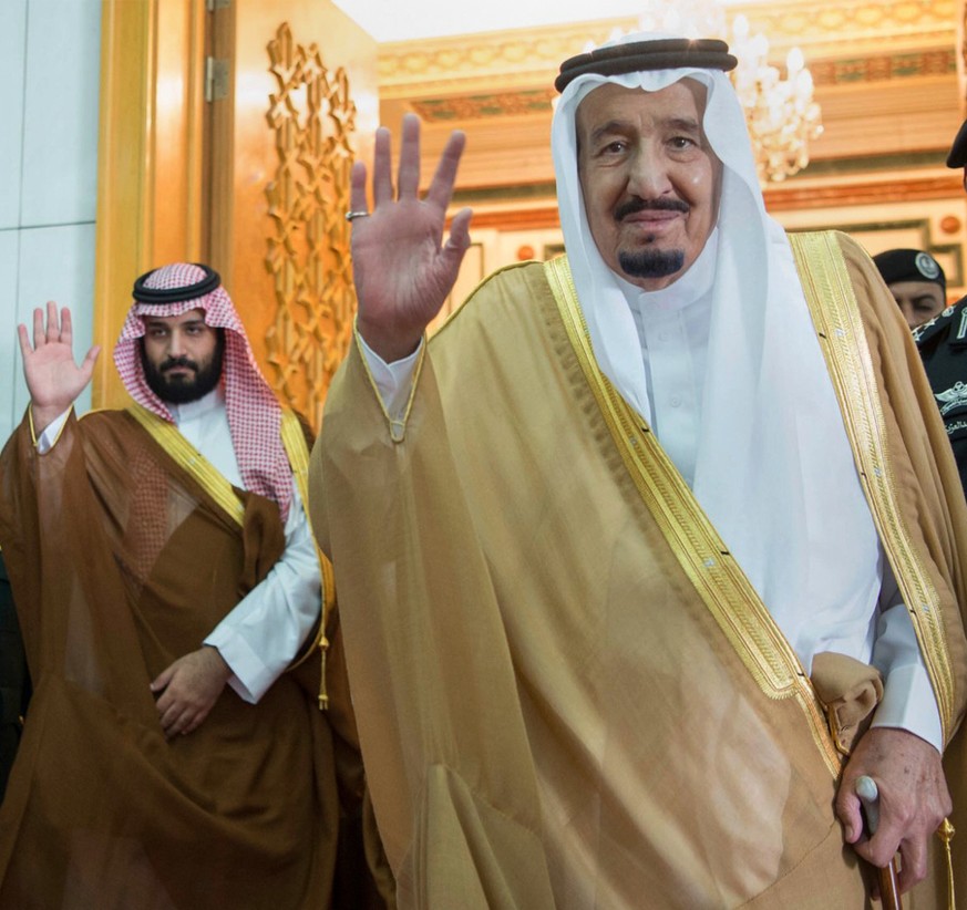 FILE -- In this April 5, 2017 file photo, released by the Saudi Press Agency, SPA, Saudi King Salman, right, and Defense Minister and Deputy Crown Prince Mohammed bin Salman wave as they leave the hal ...