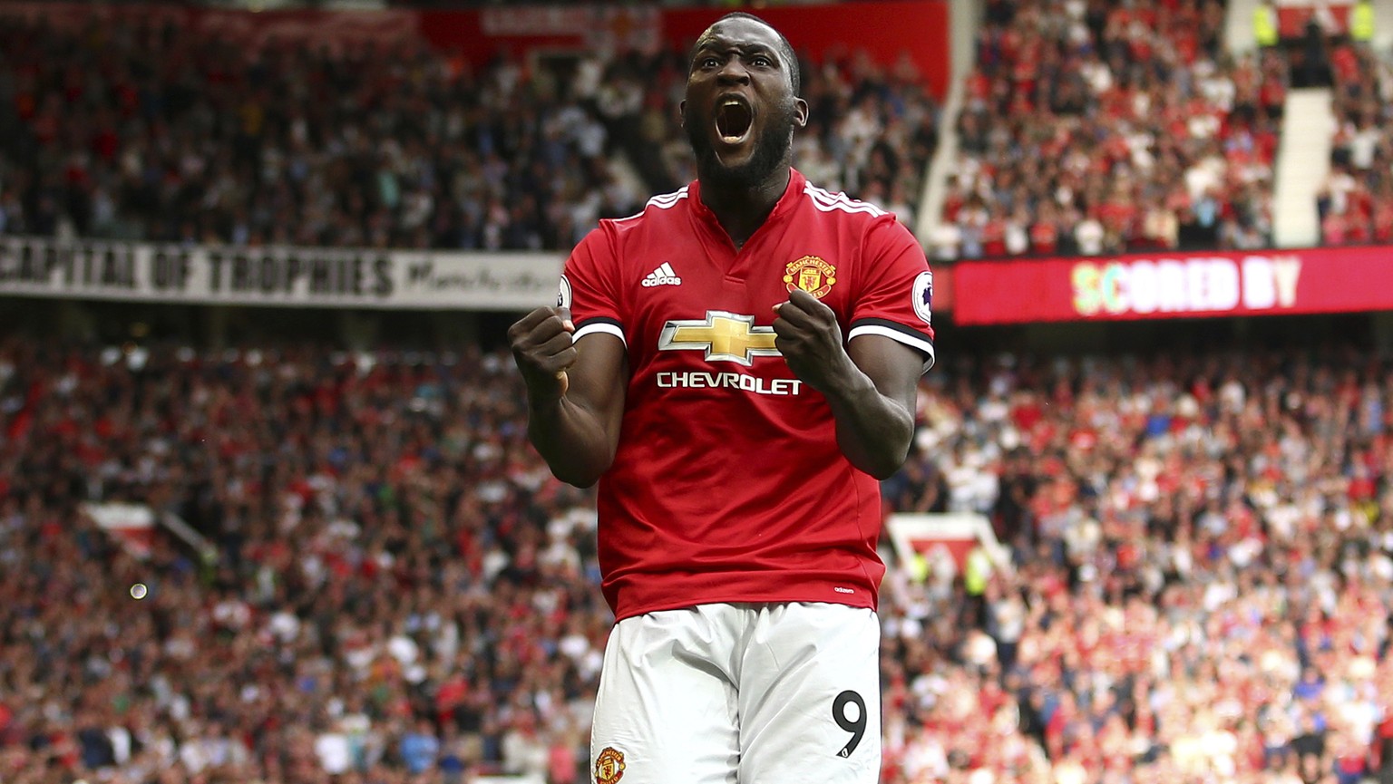 Manchester United&#039;s Romelu Lukaku celebrates scoring his side&#039;s first goal of the game during the English Premier League soccer match between Manchester United and West Ham United at Old Tra ...