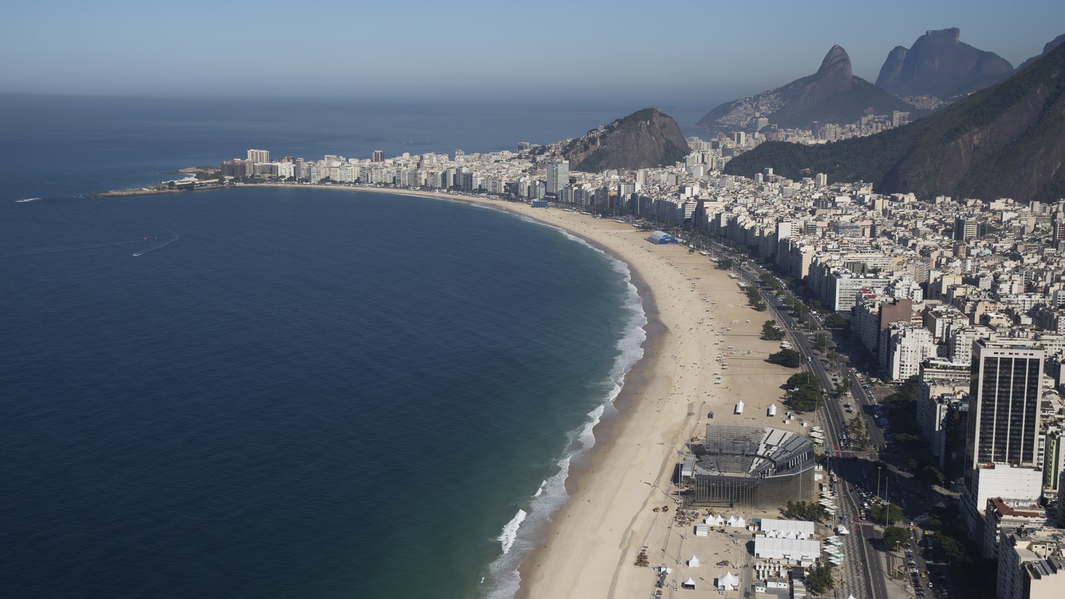 The Olympic beach volleyball venue continues under construction on Copacabana beach in Rio de Janeiro, Brazil, Tuesday, July 5, 2016. With the Olympics set to start on Aug. 5, the games and the city h ...