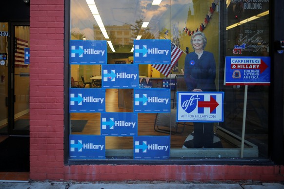 A cardboard cut out of U.S. Democratic presidential candidate Hillary Clinton stands in the window of her campaign office in Scranton, Pennsylvania July 7, 2016, the day before her campaign rally with ...