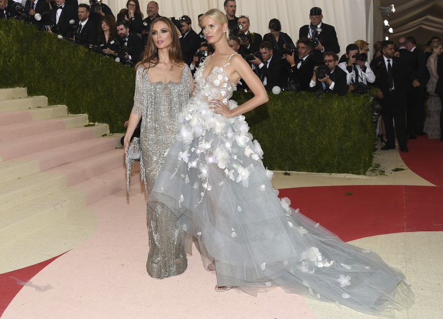 FILE - In this May 2, 2016 file photo, Marchesa designer Georgina Chapman, left, and Karolina Kurkova arrive at The Metropolitan Museum of Art Costume Institute Benefit Gala in New York. Chapman took  ...