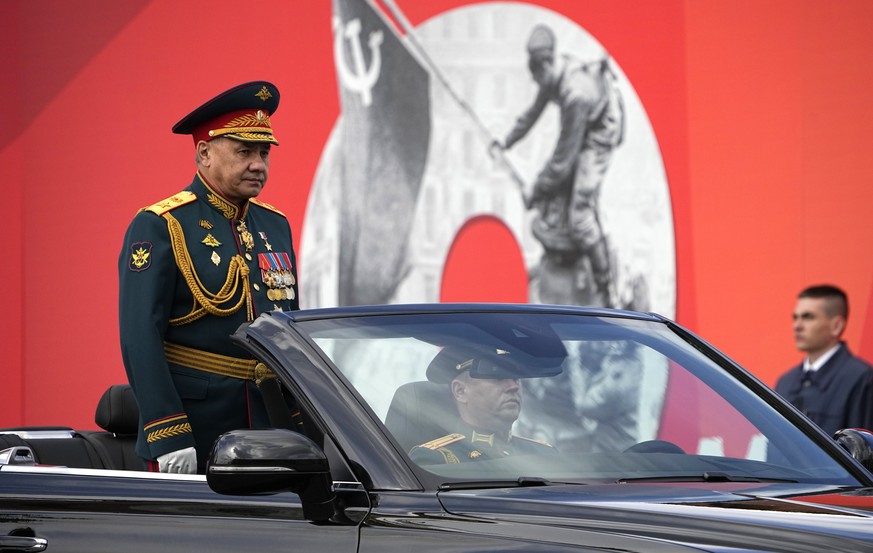 Russian Defense Minister Sergei Shoigu is driven along Red Square in the Aurus Senat car during the Victory Day military parade in Moscow, Russia, Monday, May 9, 2022, marking the 77th anniversary of  ...