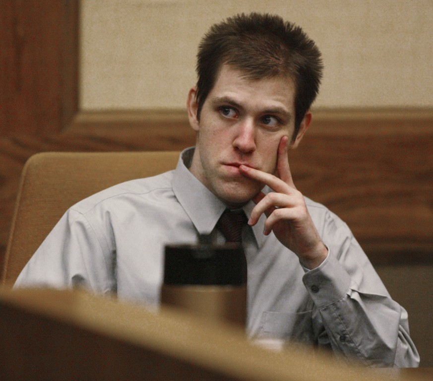 FILE - In this Thursday March 29, 2007, file photo, William Morva watches as prospective jury members are interviewed to serve in his attempted robbery trial in Montgomery County Circuit Court in Chri ...