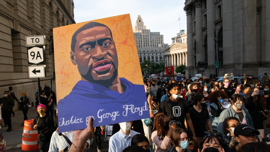 Demonstrators march through lower Manhattan during a rally to remember the murder of George Floyd on Tuesday, May 25, 2021, in New York. (AP Photo/Eduardo Munoz Alvarez)