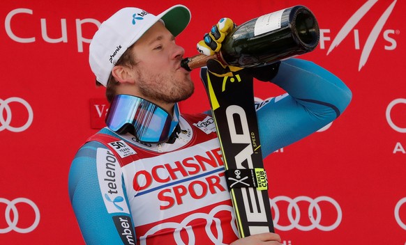 Alpine Skiing - FIS Alpine Skiing World Cup - Men&#039;s Downhill- Val d&#039;Isere, France - 3/12/16. Kjetil Jansrud of Norway celebrates on the podium. REUTERS/Christian Hartmann
