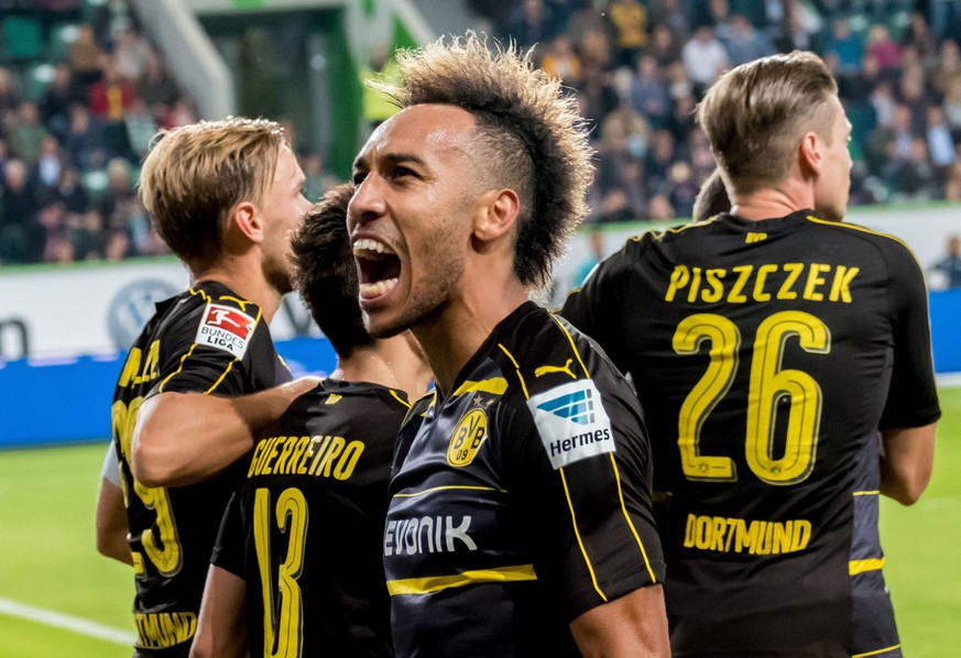 epa05549622 Dortmund&#039;s Pierre-Emerick Aubameyang celebrates after scoring the 0-2 goal during the German Bundesliga soccer match between VfL Wolfsburg and Borussia Dortmund at the Volkswagen Aren ...