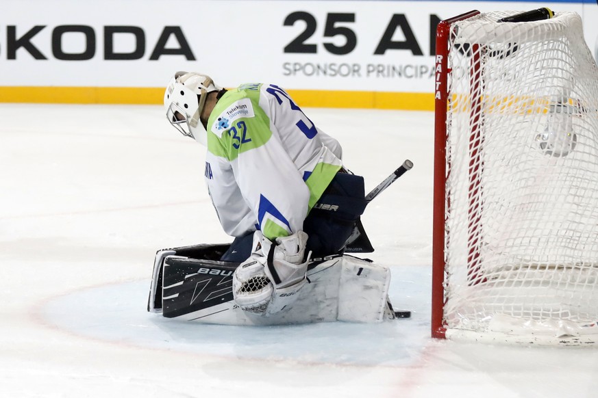 epa05959335 Goalkeeper Gasper Kroselj of Slovenia reacts after conceding a goal during the IIHF Ice Hockey World Championship 2017 group B preliminary round game between Czech Republic and Slovenia, i ...
