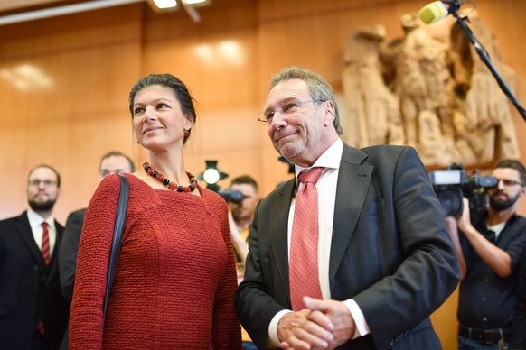 epa05583304 Parliamentary group leader Sarah Wagenknecht (L) and parliamentary representative Klaus Ernst of the party Die Linke standing in the hearing room of the German Constitutional Court in Karl ...