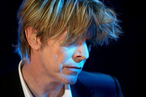 epa05096712 (FILE) A file photograph showing British singer David Bowie performing during his concert at the Stravinski hall stage of the Montreux Jazz Festival, in Montreux, Switzerland, 18 July 2002 ...