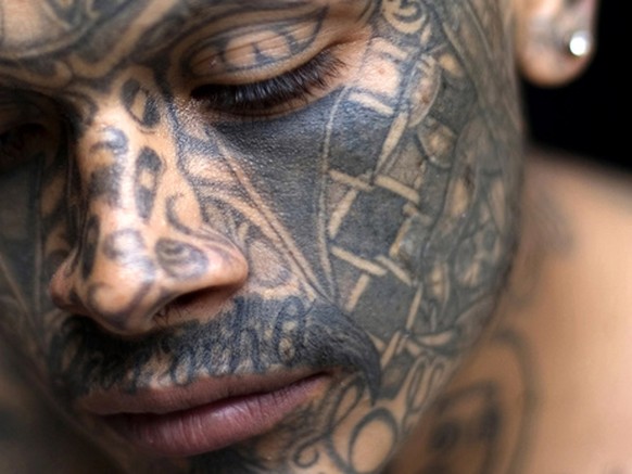 Jose Daniel Galindo, 22, a Mara gang member who identifies himself as &quot;Criminal,&quot; poses for his portrait in prison in Chimaltenango, Tuesday, Oct. 30, 2007. After anti-gang laws were approve ...