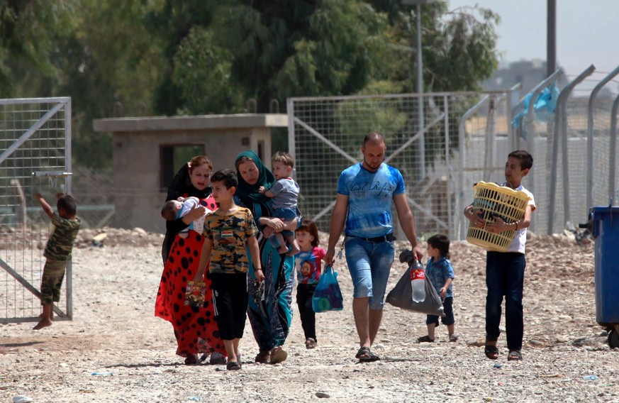 Eine Familie der Schabak, einer durch den IS bedrohte Glaubensgemeinschaft in einem Flüchtlingscamp in Erbil, Irak.&nbsp;