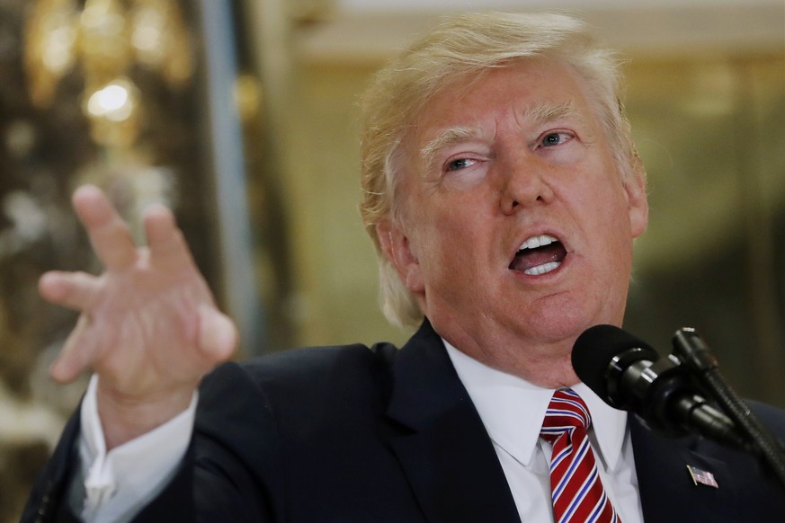 President Donald Trump speaks to the media in the lobby of Trump Tower in New York, Tuesday, Aug. 15, 2017. (AP Photo/Pablo Martinez Monsivais)