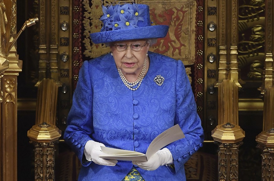 Britain&#039;s Queen Elizabeth II makes a speech in the House of Lords at the official State Opening of Parliament in London, Wednesday, June 21, 2017. Queen Elizabeth II goes to parliament Wednesday  ...