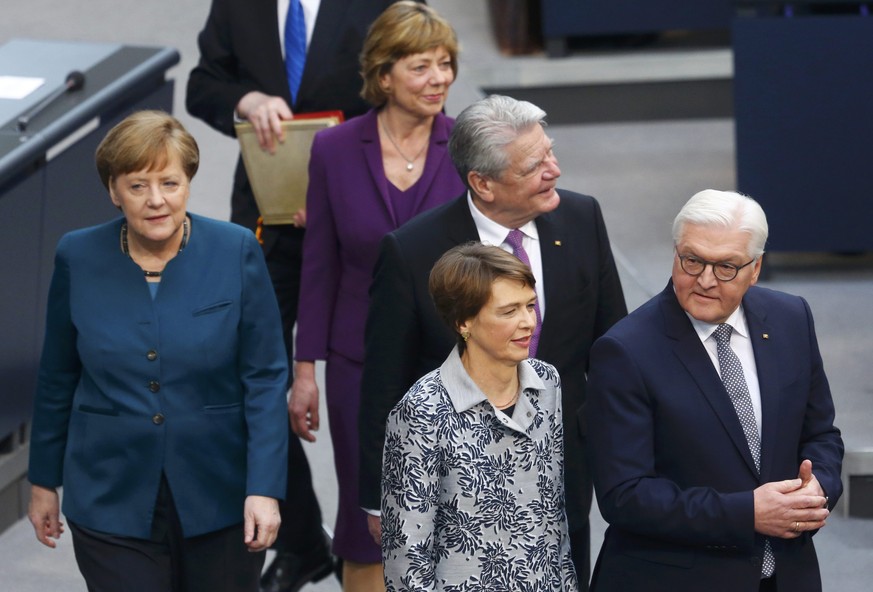 German Chancellor Angela Merkel, German President Frank-Walter Steinmeier and his wife Elke Buedenbender and Joachim Gauck and his partner Daniela Schadt during swearing-in ceremony at the lower house ...