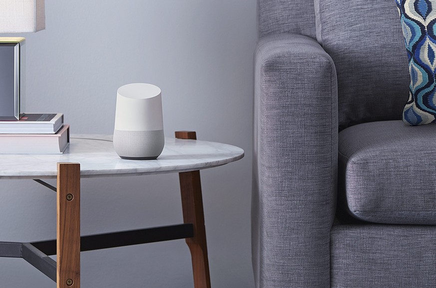 epa05315465 An undated handout made available by Google on 18 May 2016 shows Google Home (C) a voice-activated home product that will allow users to get answers from Google, stream music, and manage e ...