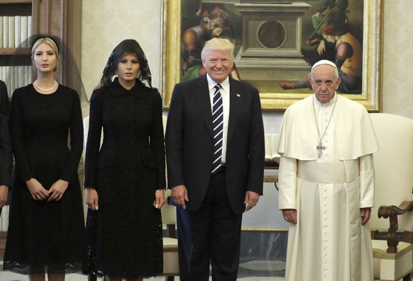 U.S. President Donald Trump, first lady Melania Trump and daughter Ivanka Trump, left, meet with Pope Francis, Wednesday, May 24, 2017, at the Vatican. (AP Photo/Evan Vucci, Pool)