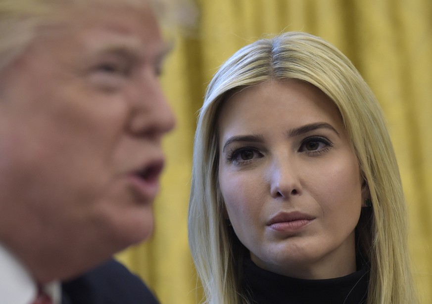 Ivanka Trump, listens as her father President Donald Trump, talks via a video conference to astronauts on the International Space Station, Monday, April 24, 2017, from the Oval Office of the White Hou ...