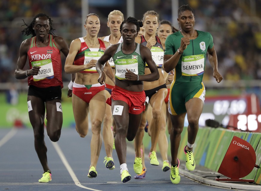 South Africa&#039;s Caster Semenya, right, leads the women&#039;s 800-meter final with Burundi&#039;s Francine Niyonsaba, center, and Kenya&#039;s Margaret Wambui, left, during the athletics competiti ...