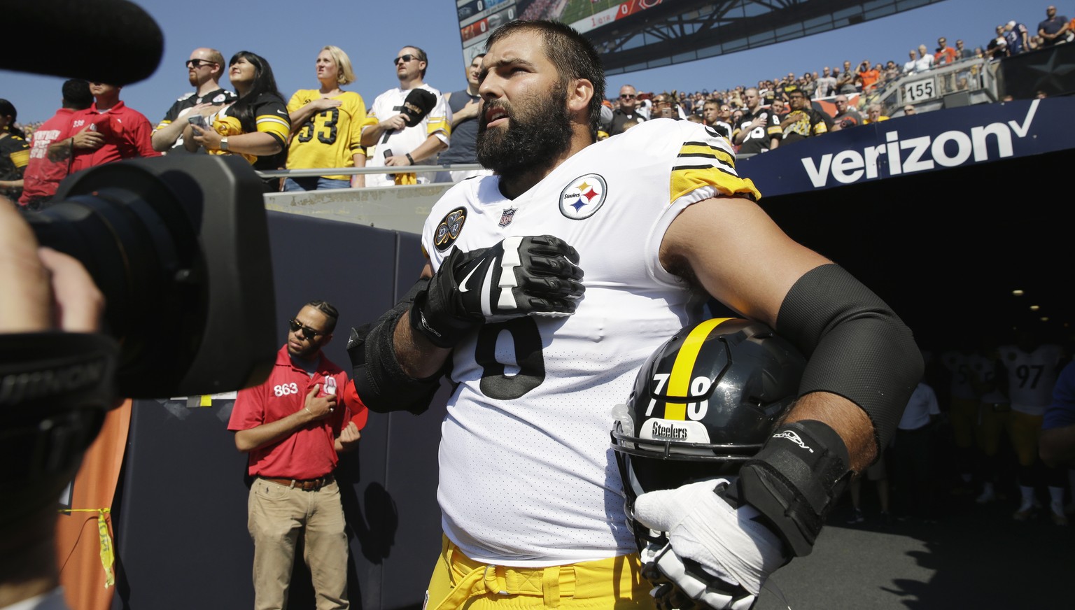 Pittsburgh Steelers offensive tackle and former Army Ranger Alejandro Villanueva (78) stands outside the tunnel alone during the national anthem before an NFL football game against the Chicago Bears,  ...