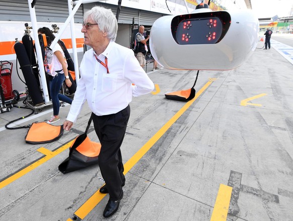 epa05520440 Formula One boss Bernie Ecclestone walks in the pit lane during the first practice session of the 2016 Formula One Grand Prix of Italy at the Formula One circuit in Monza, Italy, 02 Septem ...