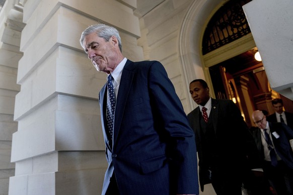 FILE- In this June 21, 2017, file photo, former FBI Director Robert Mueller, the special counsel probing Russian interference in the 2016 election, departs Capitol Hill following a closed door meeting ...